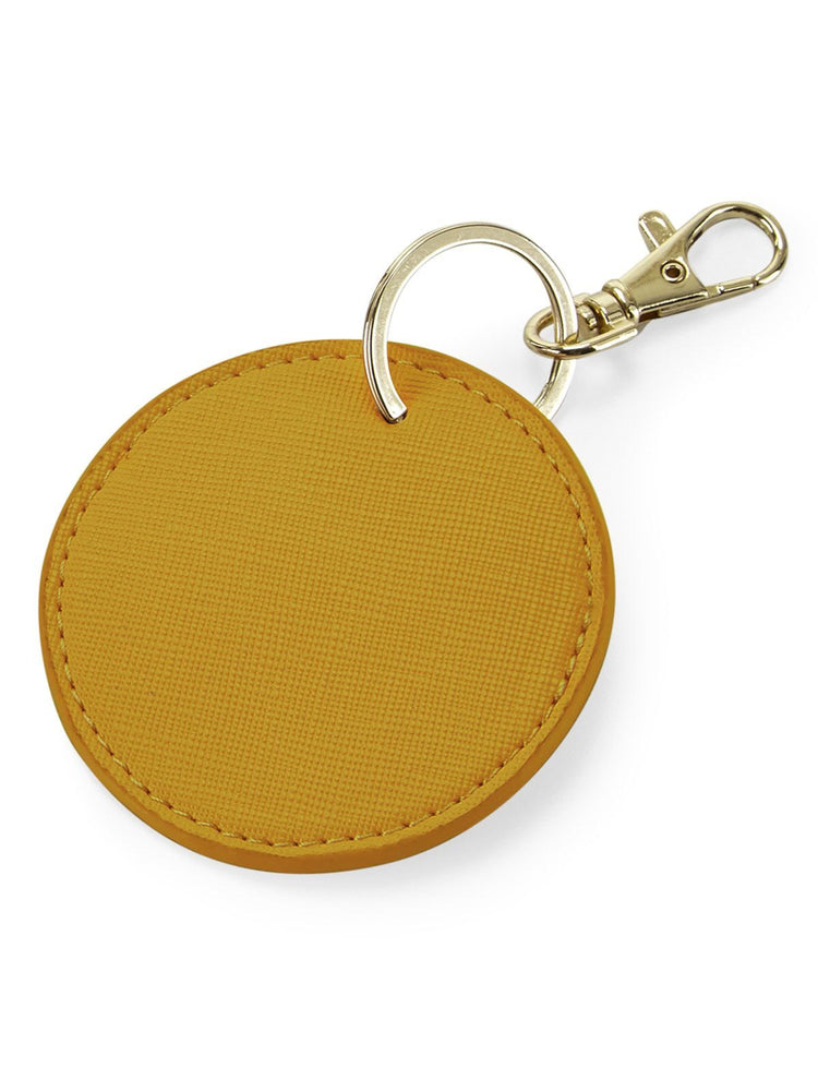 Portachiavi rotondo in similpelle PU, effetto saffiano, con moschettone